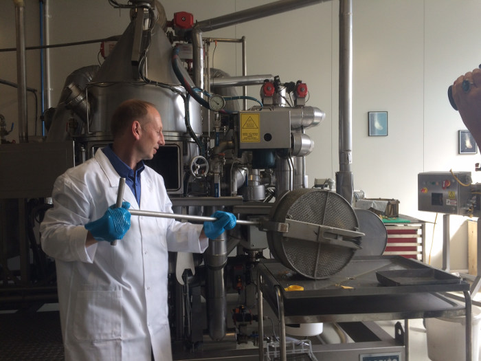 The expert food technologist, Arnaud Jansse, is testing a food product for nutritional value, taste, crispiness, oil uptake, texture, etc. At tna food technology testing centre in Woerden, Netherlands.