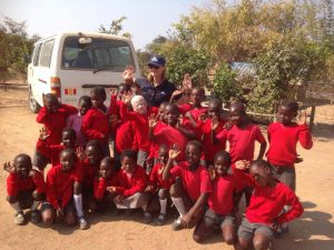 a picture of tna's ‘Caring for Kids’ tour in Africa, where Nadia Taylor recently visited tna’s highly successful project in Zambia and meeting with the 60 sponsored children and their families.