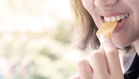 image of a person having a snack