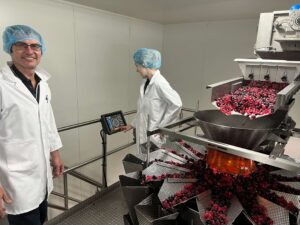 Raymond Wicks, General Manager Kingsway Confectionery with the tna intelli-weigh omega series